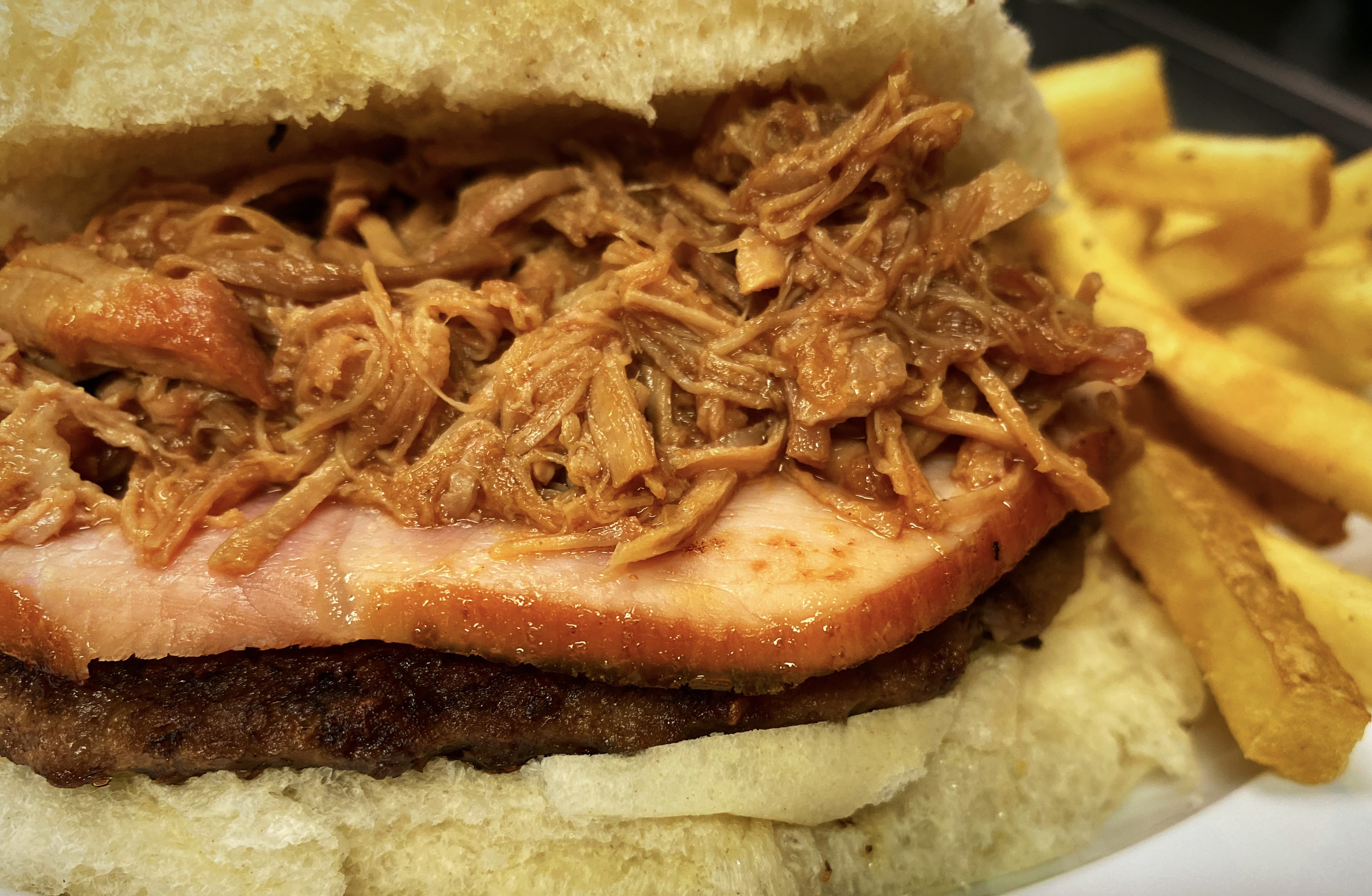 Toni's Burger with bacon and chili cheese fries